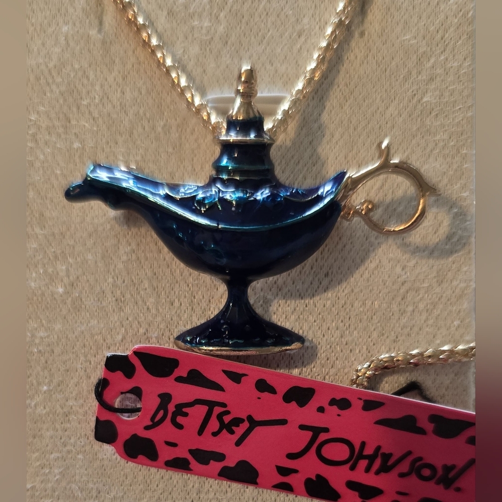 Betsey Johnson Long Sweater Necklace With A Lamp Charm.
